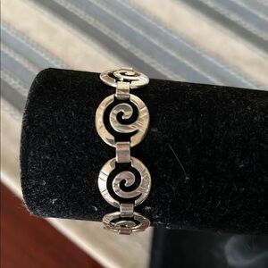 Elegant Silver Swirl Bracelet